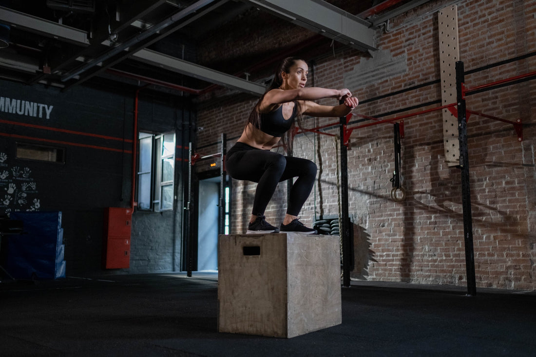 woman doing box jumps